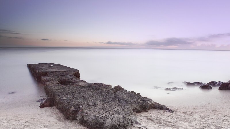 Rocky Pier on Beach