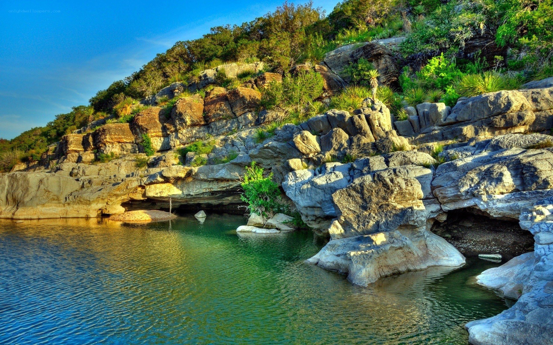 rocky river canyon at sunset
