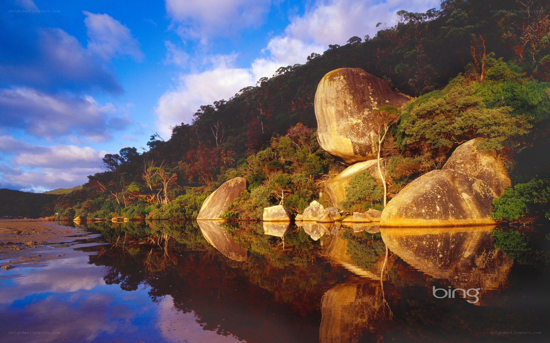 Rocky river landscape at sunset