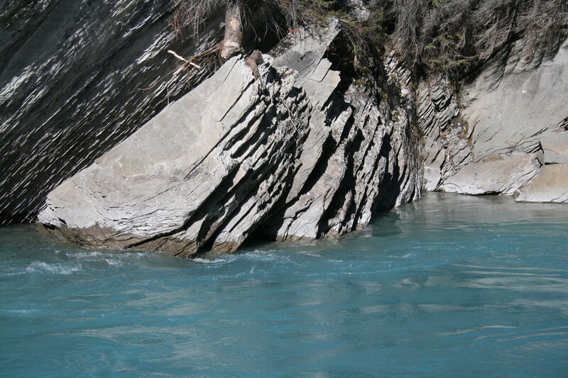 Rocky Riverbank — Blue