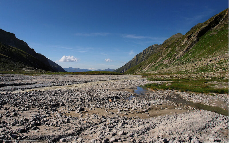 Rocky Riverbed in Valley — Blue