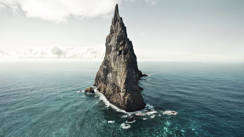 Rocky Sea Stack — Blue, Serene, Afternoon, Photograph, Ocean, Sky