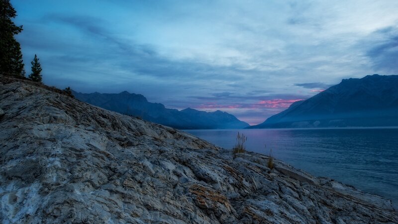 Rocky Shore at Dusk — Blue, Serene, Sunset, Photograph, Mountains