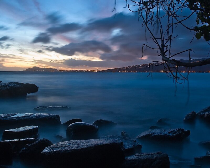 Rocky Shore at Dusk — Blue, Serene, Sunset, Photograph, Rocks, Sea