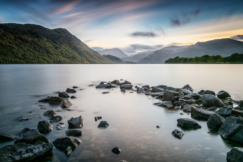 Rocky Shore at Lake — Blue, Serene, Sunset