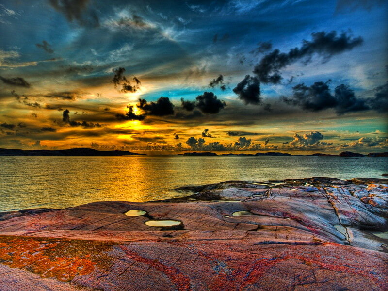 Rocky Shore at Sunset — Blue