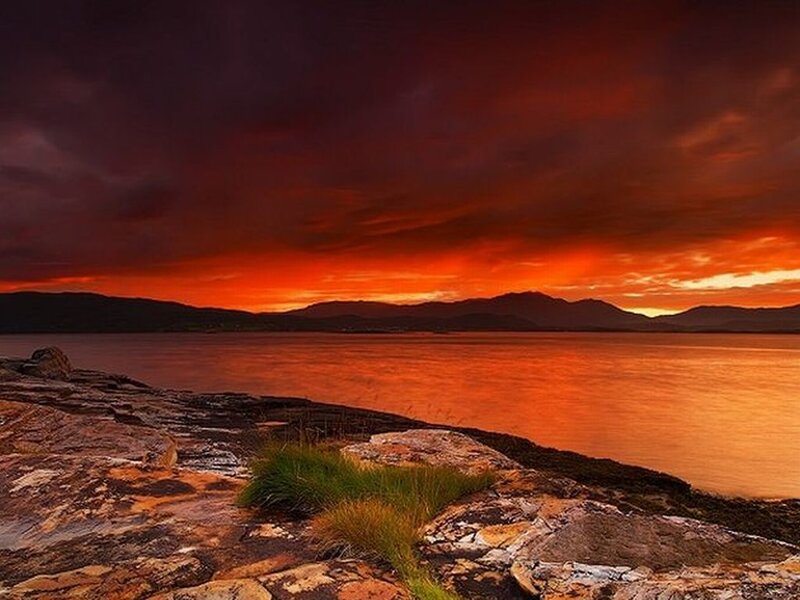 Rocky Shore at Sunset — Orange