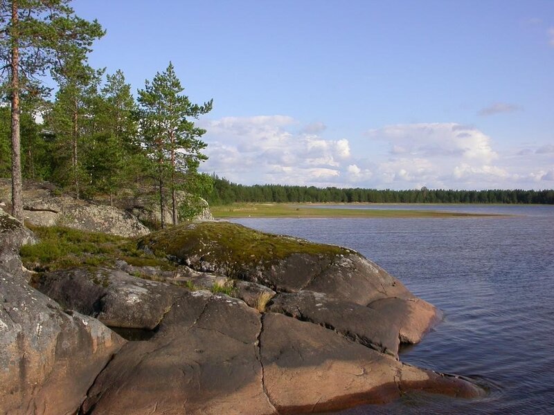 Rocky shore by a calm lake