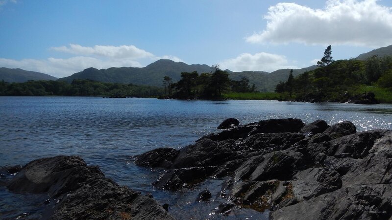 Rocky Shore by Lake — Blue, Serene