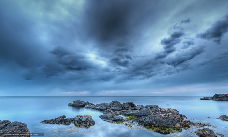 Rocky Shore under Storm Clouds