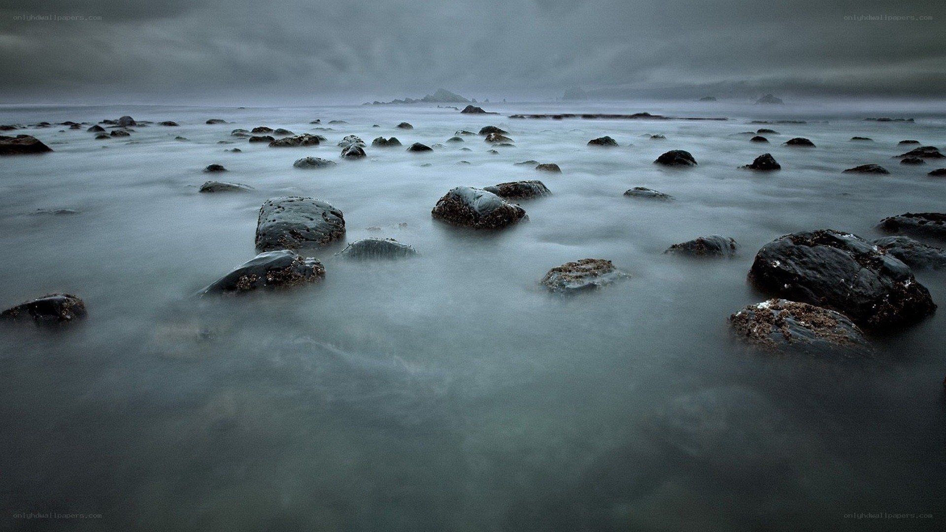 Rocky shore under stormy sky