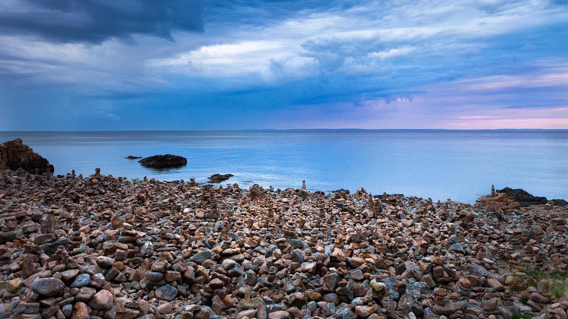 Rocky shore under stormy sky