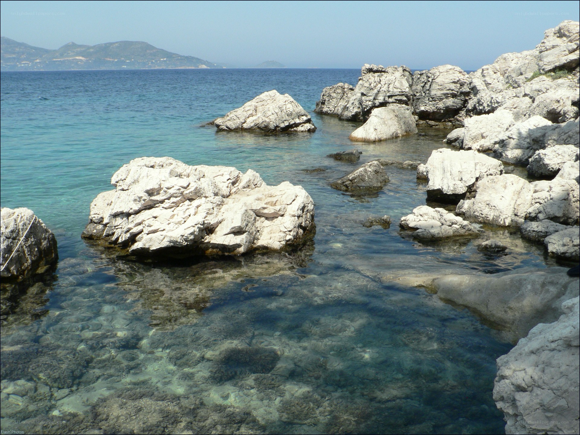 rocky shore with clear water