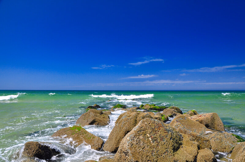 Rocky shore with turquoise waves