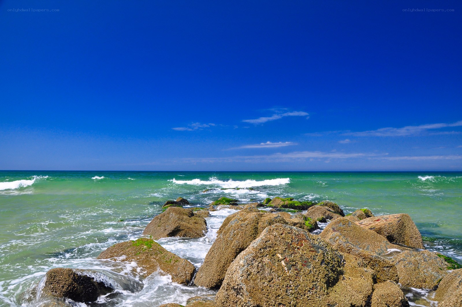 Rocky shore with turquoise waves
