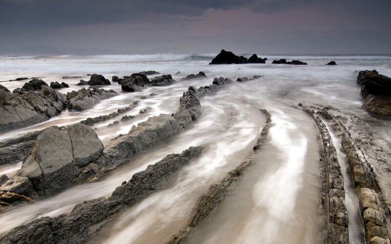 Rocky Shoreline at Coast — Gray, Dramatic, Photograph