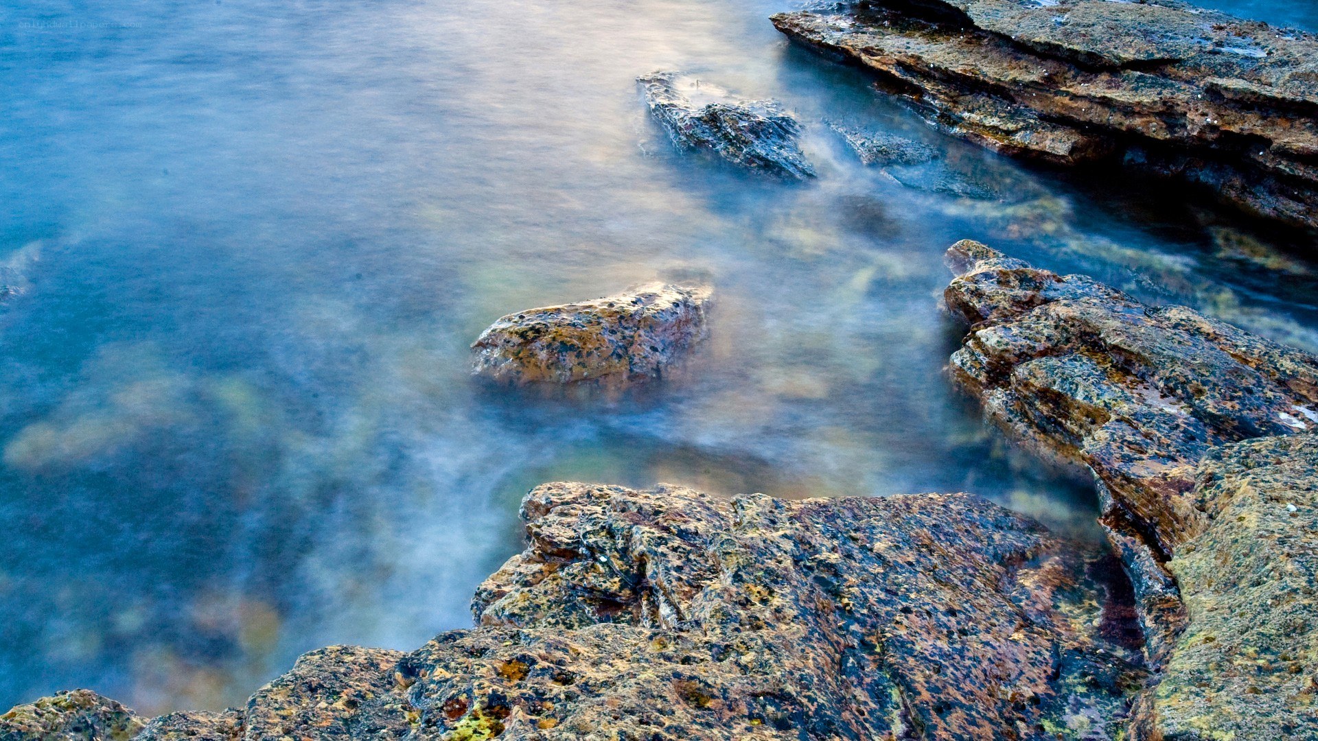 Rocky shoreline at dusk
