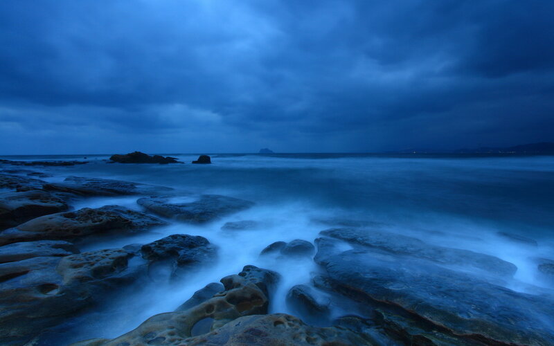 Rocky Shoreline at Dusk — Blue, Dramatic, Night, Photograph, Ocean