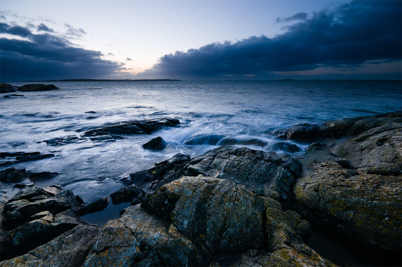 Rocky Shoreline at Dusk — Blue, Dramatic, Night, Photograph