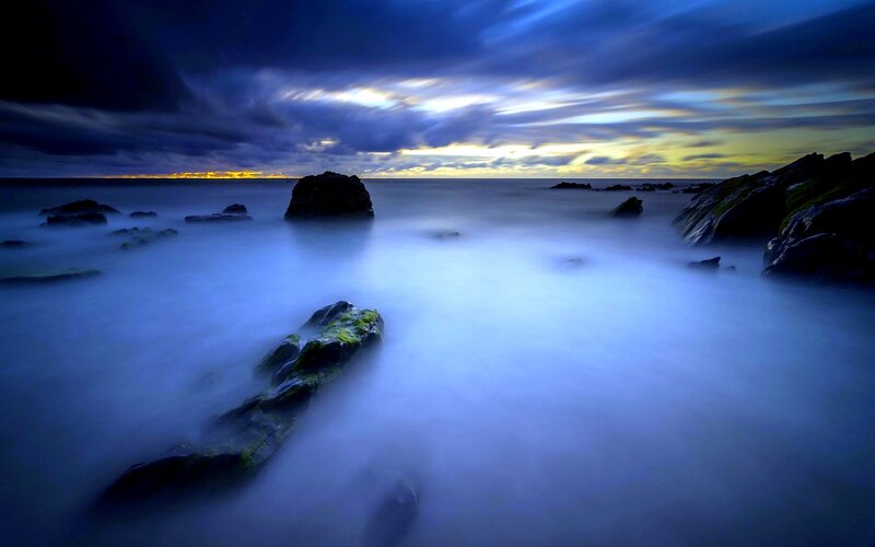 Rocky Shoreline at Dusk — Blue, Dramatic, Sunset, Photograph, Rocks