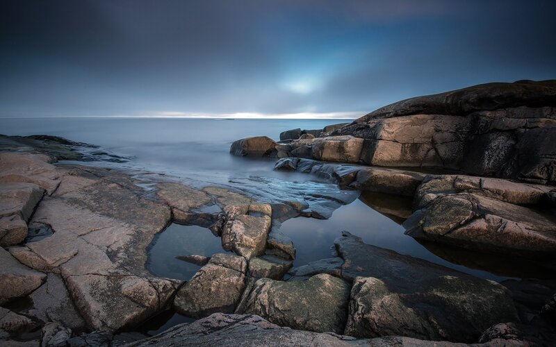 Rocky Shoreline at Dusk — Blue, Serene, Night, Photograph, Rocks, Ocean