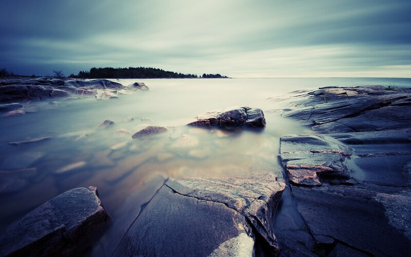 Rocky Shoreline at Dusk — Blue, Serene, Photograph, Rocks, Water, Sky