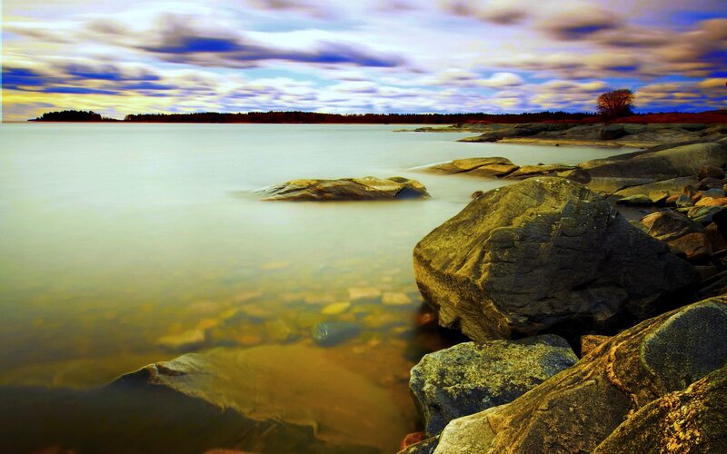 Rocky Shoreline at Dusk — Blue, Serene, Photograph, Rocks, Water
