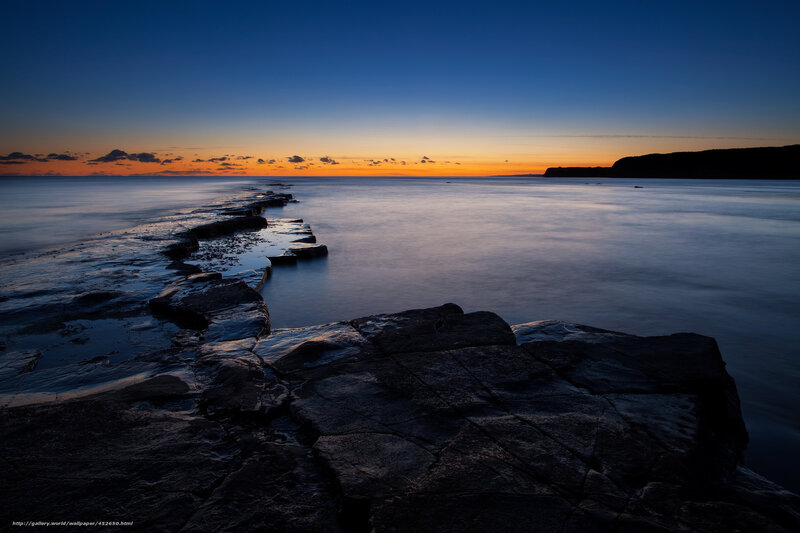 Rocky Shoreline at Dusk — Blue, Serene, Sunset, Photograph, Ocean, Sky