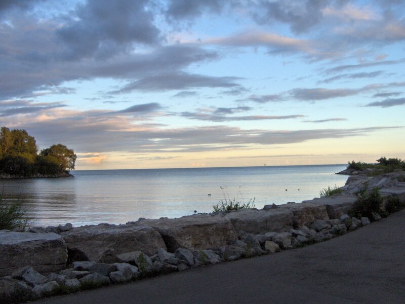 Rocky Shoreline at Dusk — Blue, Serene, Sunset, Photograph, Water