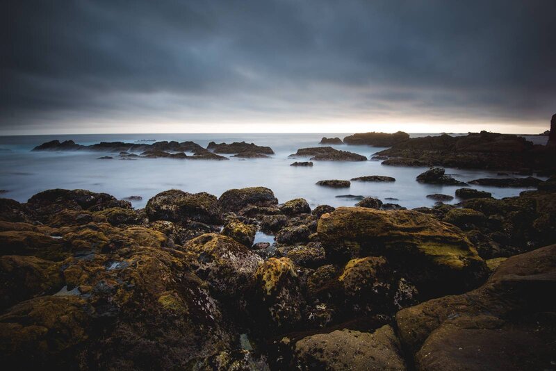 Rocky Shoreline at Dusk — Gray, Dramatic, Night, Photograph