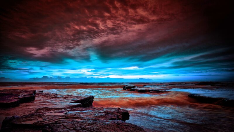 Rocky Shoreline at Dusk — Red