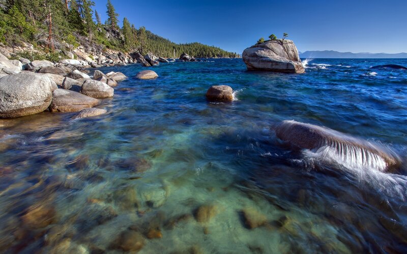 Rocky Shoreline at Lake — Blue, Serene, Afternoon, Photograph