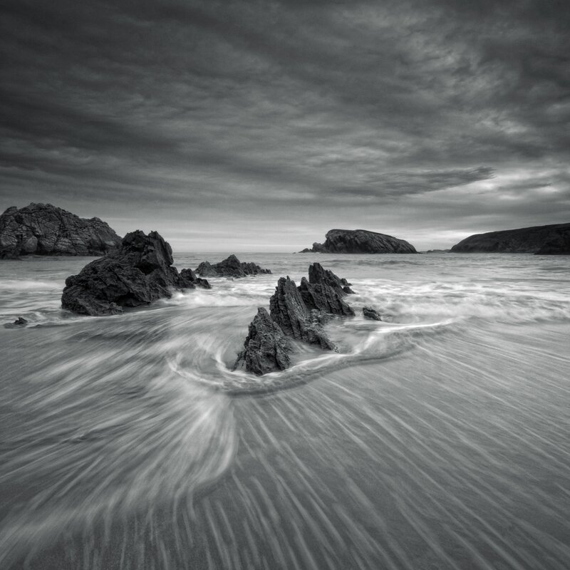Rocky Shoreline at Low Tide — Black