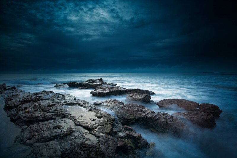 Rocky Shoreline at Night — Blue