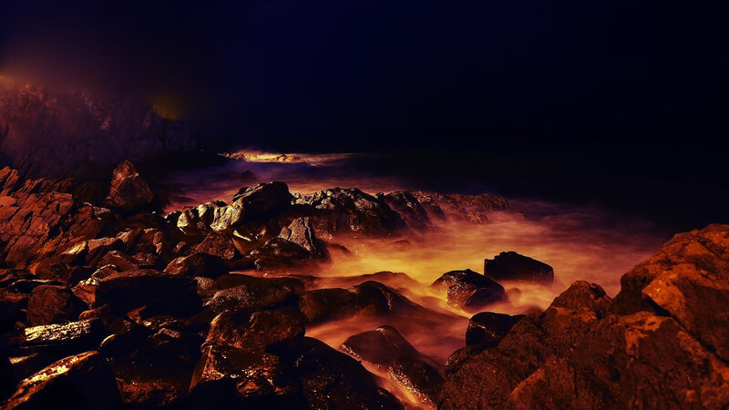 Rocky Shoreline at Night