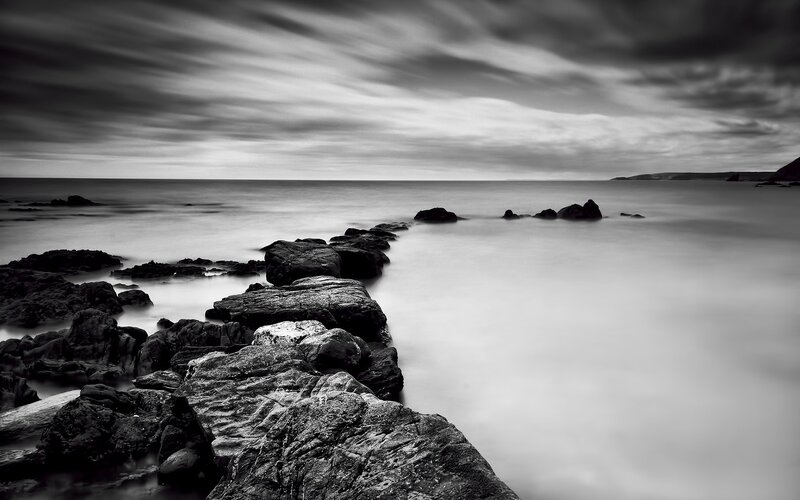 Rocky Shoreline at Sea — Black