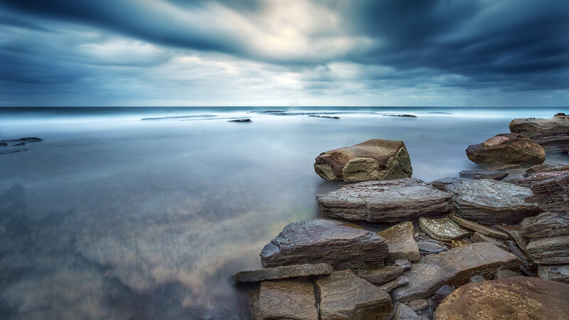 Rocky Shoreline at Sea — Blue, Dramatic, Photograph