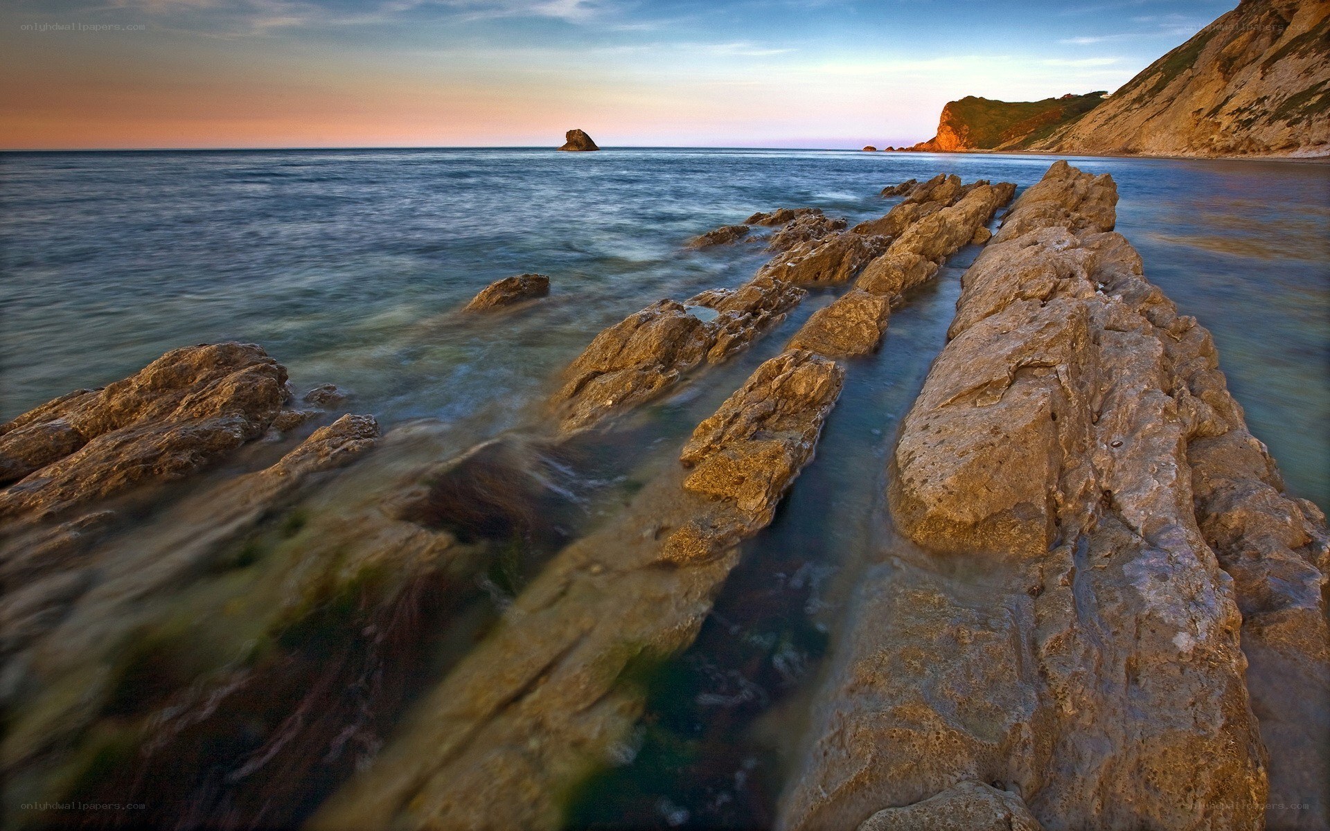 Rocky shoreline at sunset