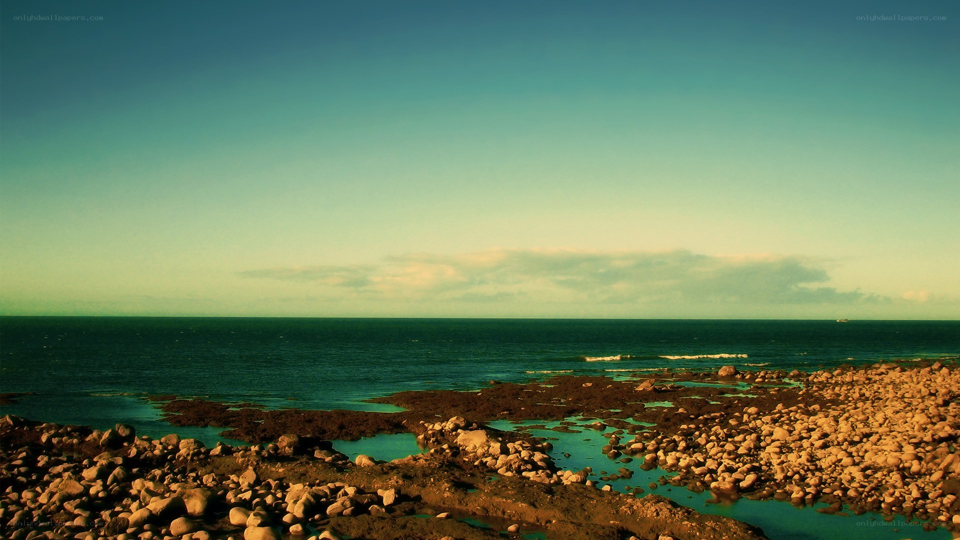 Rocky shoreline at sunset