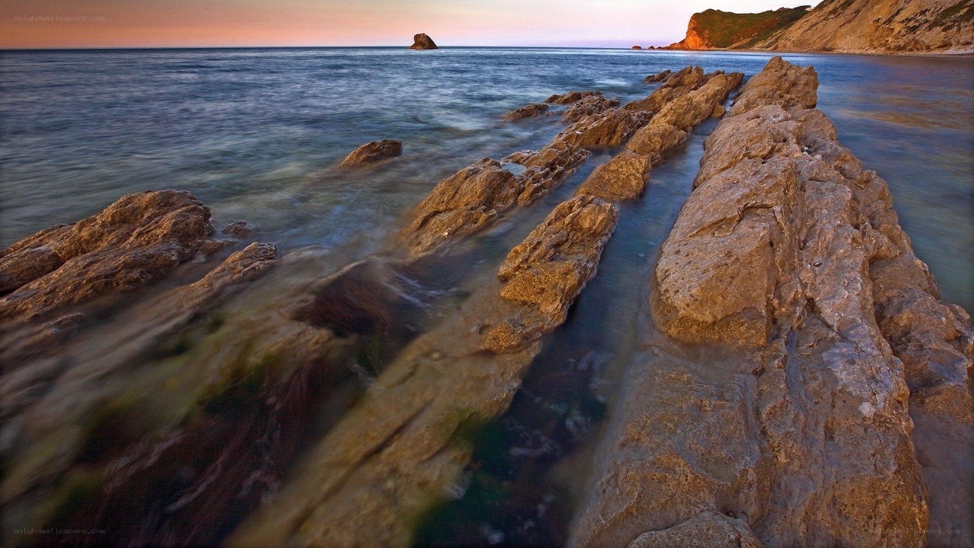 Rocky shoreline at sunset