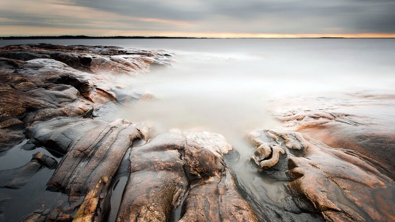 Rocky shoreline at sunset