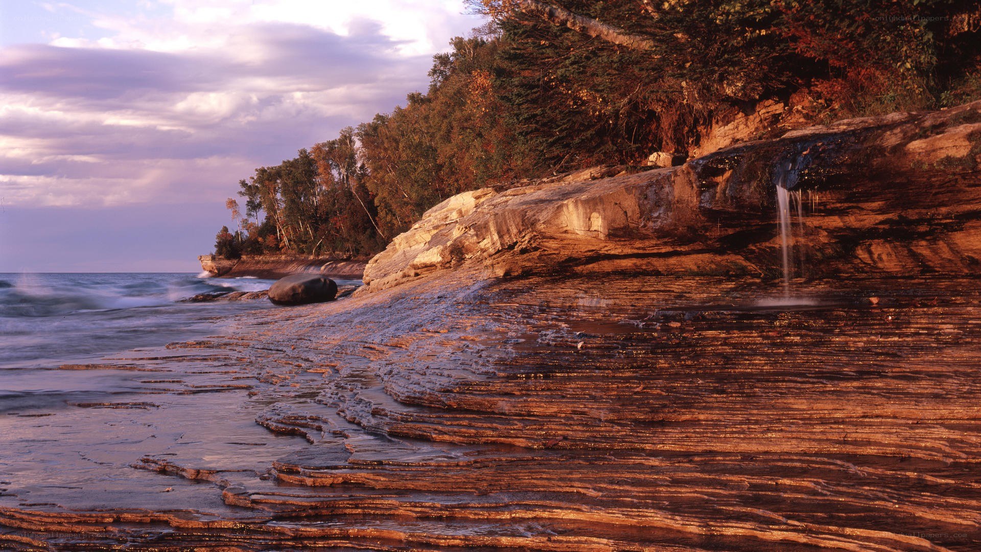 Rocky shoreline at sunset