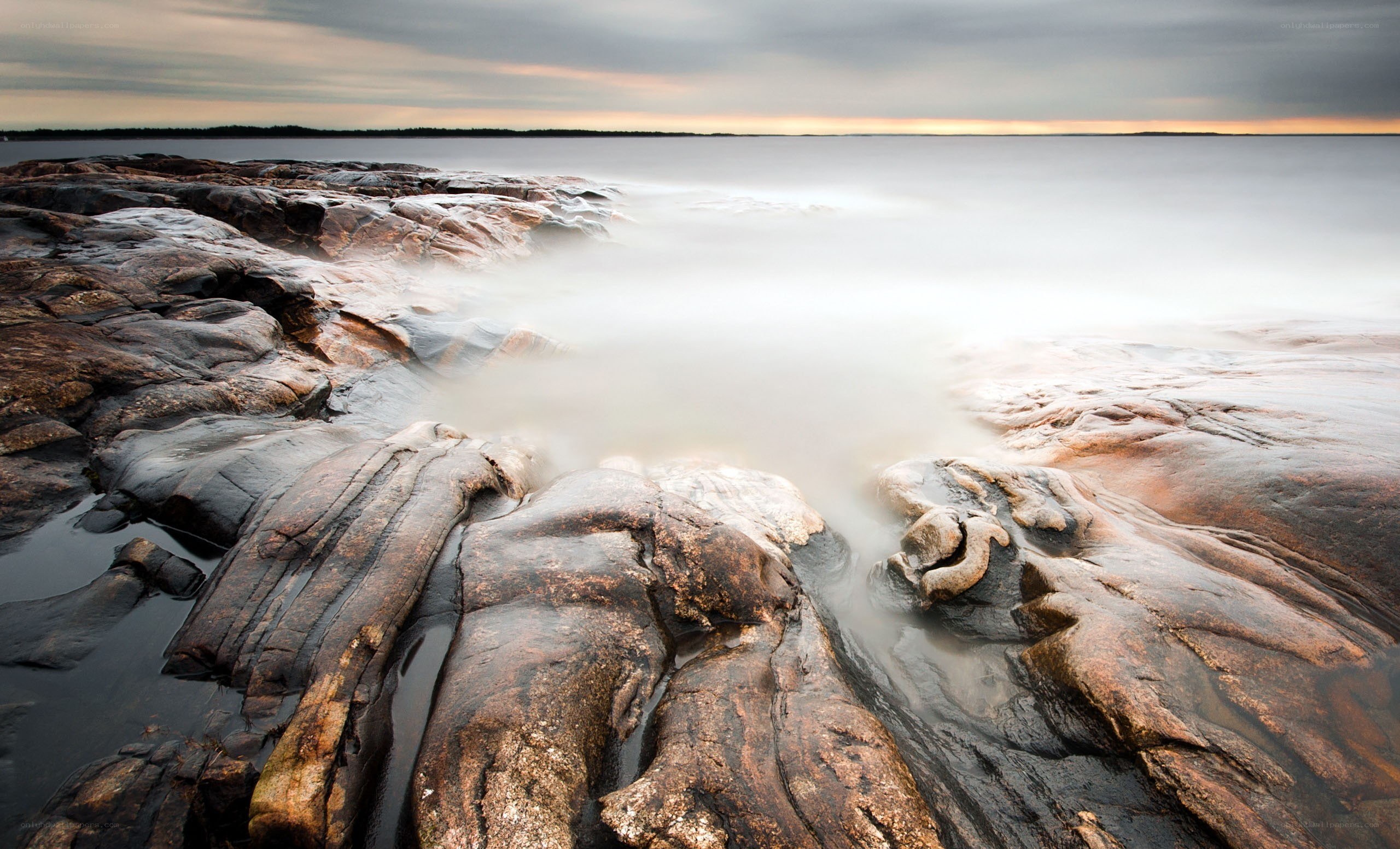 Rocky shoreline at sunset