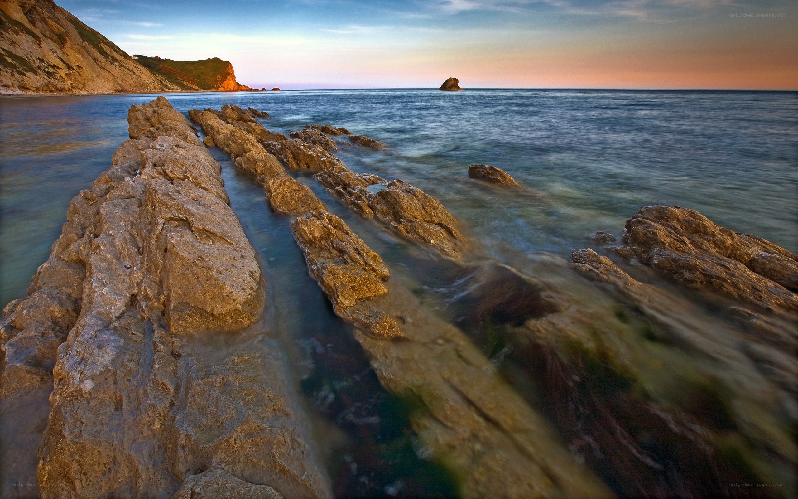 Rocky shoreline at sunset