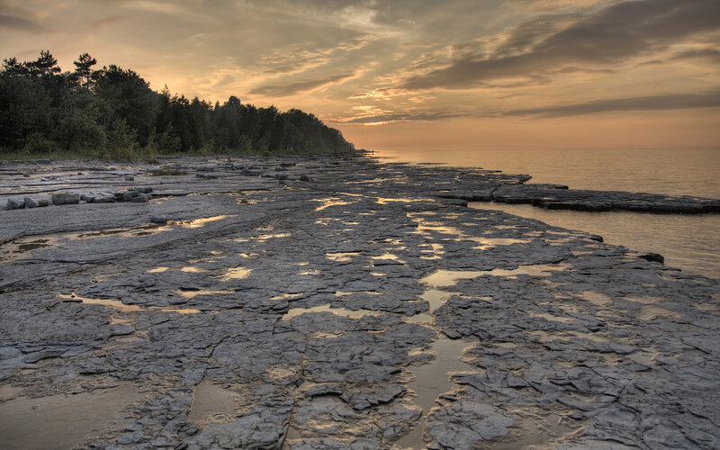 Rocky shoreline at sunset