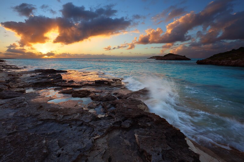 Rocky Shoreline at Sunset — Blue, Dramatic, Photograph, Ocean, Clouds, Island