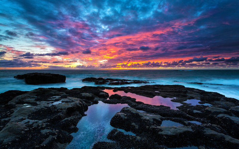 Rocky Shoreline at Sunset — Blue, Dramatic, Photograph, Ocean, Clouds, Rocks