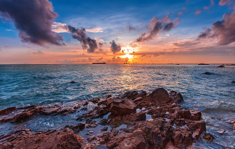 Rocky Shoreline at Sunset — Blue, Dramatic, Photograph, Ocean, Clouds, Ship