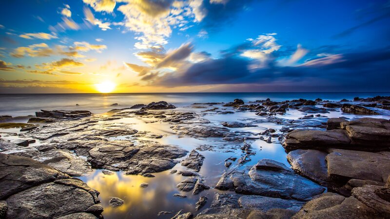 Rocky Shoreline at Sunset — Blue, Dramatic, Photograph, Sun, Ocean, Clouds