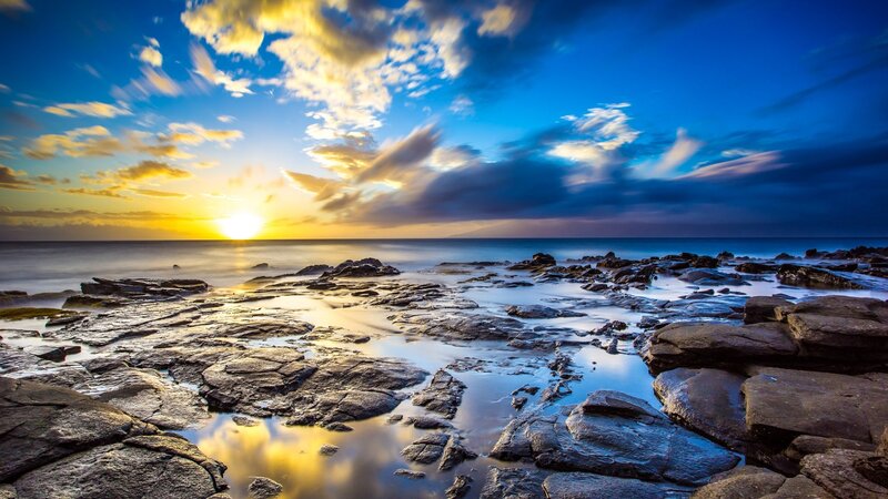 Rocky Shoreline at Sunset — Blue, Dramatic, Photograph, Sun, Ocean